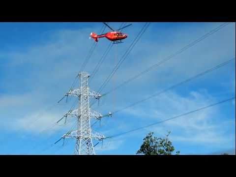 Helicopter power line maintenance in New Zealand