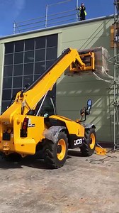 The handy JCB 540-140 Telehandler offering a hand to Geo Green Power, installing solar panels on the roof at TCH JCB HQ ☀️🔋 | TC Harrison JCB