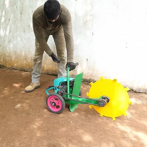 DIY Homemade EARTH SOIL DIGGER Machine Using ChainSaw! Hello Everyone! Today I show you how to make a homemade trencher machine using chainsaw. This diy trencher machine is powered by a 58cc chainsaw machine. I used metal round disc and L angle to make the trencher digging mechanism. Unfortunately this diy trencher attachment for chainsaw doesn't work well because the torque produced by this 58cc mini chainsaw engine is very low which is not sufficient to dig the trench. I know a 250cc engine ca