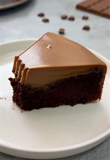 Chocolate brownie! ingredients: •4 eggs 250g sugar 2 full tbsp flour 2 full tbsp cocoa powder •250g butter 200g dark chocolate ganache: 250g chocolate 200ml hot heavy cream 180°C- 20-25mins Beat the eggs with the sugar until light and fluffy, add the sifted flour and cocoa powder, (2 full tbsp or 3 tbsp) mixing until smooth. Melt the butter with the dark chocolate and let it cool slightly, then add to the bowl. Pour the batter into a pan with paper, bake in a preheated oven at 180°C (350°F) for 