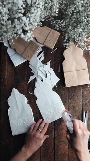 Make oversized paper snowflakes to transform your home for the holidays