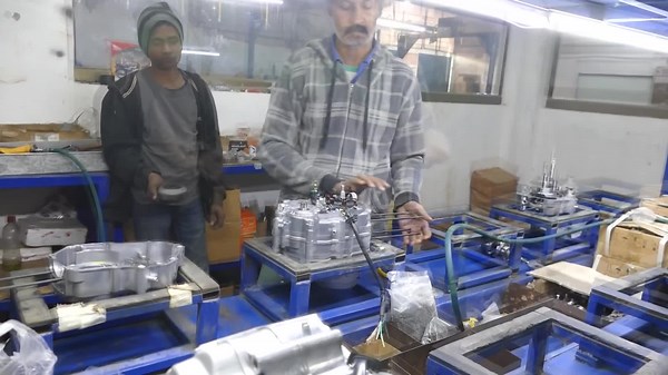 Assembling Motorcycle Engines Inside the Factory