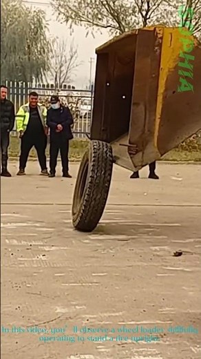 Wheel Loader Tire Trick: See How to Stand a Tire Upright with Skilled Operation!