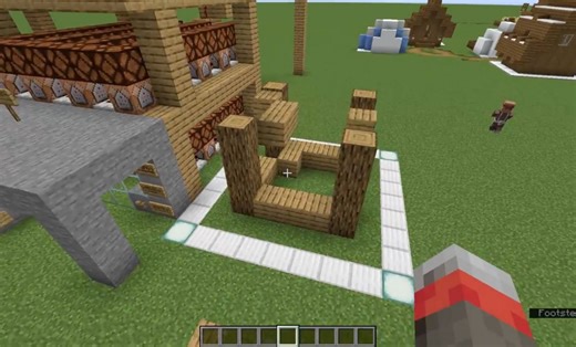 Minecraft player uses command blocks to automatically build house