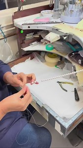 Stringing Pearls! Here’s our expert pearl stringer, stringing a gorgeous Akoya pearl strand. She double knots each pearl using a silk string so that they’re securely attached for long-term use. Without our double knotting technique, strands will lengthen and loose their shape easily, plus if you happen to snag or rip the strand, all the pearls will come off! Get your quality, expertly crafted pearls strands to ensure life-long use. | Maui Divers Jewelry