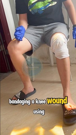 Bandaging knee wound using triangular bandage. #firenuzzle #bandaging #firstaid