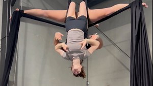 Circus duo showcases strength and precision via a breathtaking aerial stunt