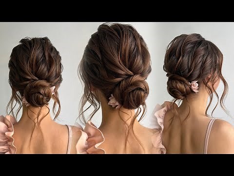 Voluminous textured low bun. Wedding hairstyle