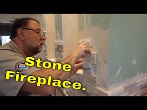 Stacked stone Fireplace. Entire install