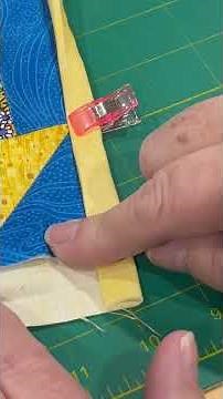 How to do a Mitered Corner when Binding a Quilt using the Backing Fabric