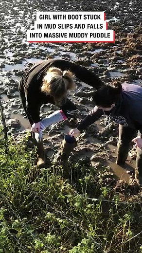 Girl Stuck in Mud Slips and Falls into Massive Muddy Puddle