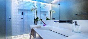 How to Install Frameless Glass Shower Panels | DoItYourself.com