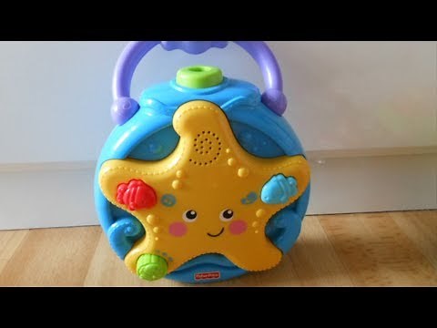 Fisher Price Ocean Wonders Take Along star Projector Soother toy