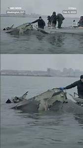 Video shows recovery of Army Blackhawk helicopter wreckage in Potomac River.