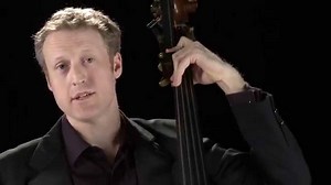 Over the past decade, we've been creating a sizeable collection of guides to the instruments of the orchestra. While we cannot play for you in person, we'll be sharing some of these to help you explore the world of classical music from your home. In this film, Michael Fuller introduces his instrument - the double bass. | Philharmonia Orchestra