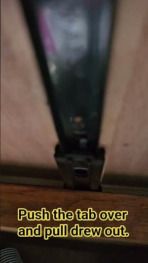 how to remove a cabinet drawer.