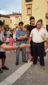 A very aggressive session of "Morra", an Italian game of throwing hands and shouting numbers