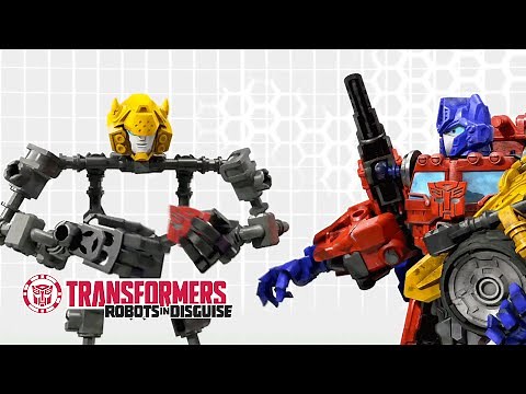 Transformers: Construct-Bots - Optimus Prime Helps Complete Bumblebee | Transformers Official