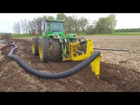 Laying 8" field drain tile