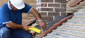 How to Install Roof Flashing against a Brick Wall | DoItYourself.com