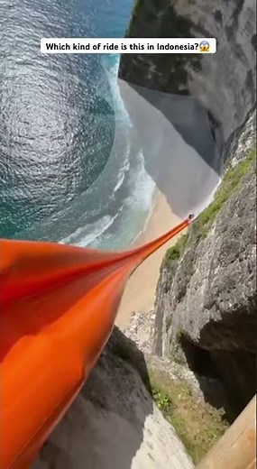 Orange Cliff Slide is wild! 😱🔥Girl slides into beach! AI adventure visuals#ScaryRide #TravelWonder