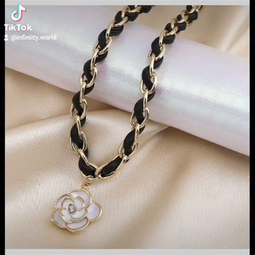 2.7K views | Black ribbon coin style neckpiece  Inbox us to order  | Infiniity World | Facebook