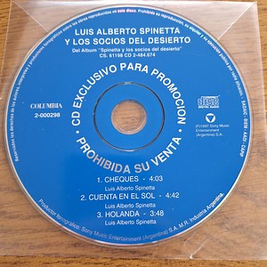 Spinetta Y Los Socios Del Desierto - Cheques