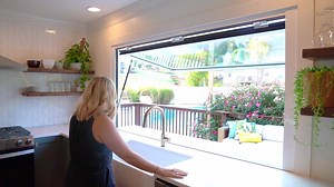 ActivWall's customizable Gas Strut Window opens up and out to create a perfect serving space. Request a quote today to add some "wow" factor to your home! | ActivWall