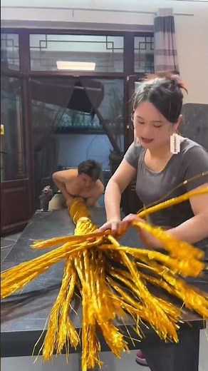 A home ornament woven from a single piece of wire.