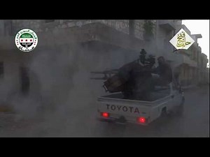 Anti-aircraft machine gun ZPU-4 mounted on a Toyota pickup is firing direct fire