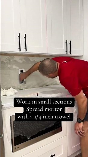 Installing our kitchen backsplash