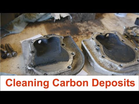 Cleaning carbon deposits on Briggs and Stratton twin cylinder heads and pistons