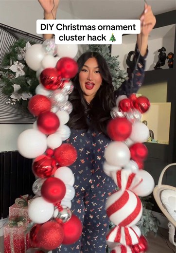 How gorgeous is my tree & decorations this year from @WeRChristmas I used garden wire and 3 colours of baubles: red, white and silver. (Try to stick with 1-3 colours max) Group 3-5 baubles together that are different sizes. Twist the wire so the ball balls don't fall though and leave about 6 inches at the end so you can easily secure the cluster straight onto the tree! Pro tip: hang the clusters inside the tree, not just on the tips, to instantly make it look fuller. Bonus hack (don't judge me):