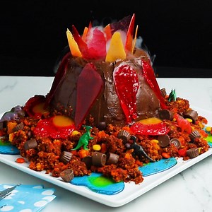 This show-stopping volcano cake is perfect for a birthday party. Your guests will be in awe when you add the dry ice and water to the mason jar hidden inside of the cake! 🌋 FULL RECIPE: https://tasty.co/recipe/volcano-cake | Tasty UK