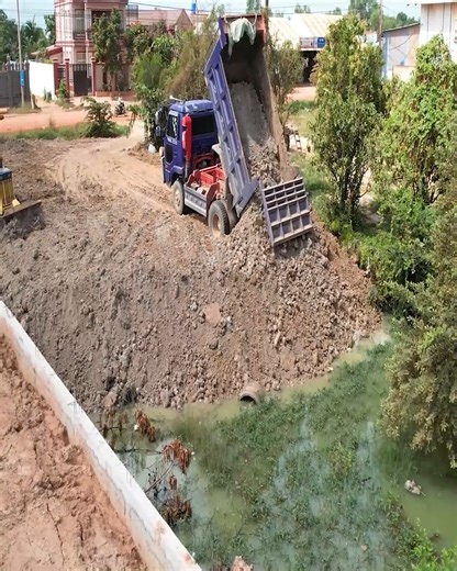 8.8K views · 123 reactions | A fully successful project completed in just one day using the D21A bulldozer and a 5-ton dump truck to push soil | Excavator Bulldozer | Facebook