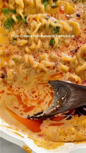 Creamy Shin Ramen in 5 minutes 🍜🔥 Spicy Shin Ramen made extra creamy with heavy cream and cheddar cheese, finished with green onions and chili oil. 📌 Save this easy ramen recipe for later. ✨ 5-Minute Creamy Shin Ramen 📝 Ingredients • 1 pack Nongshim Shin Ramen • 1 cup water • 1/2 cup heavy cream • 1 slice cheddar cheese • Chopped green onions • Chili oil 👩‍🍳 Directions 1. Add 1 cup of water to a pan and bring to a boil. 2. Add the Nongshim Shin Ramen noodles, soup powder, and vegetable fla