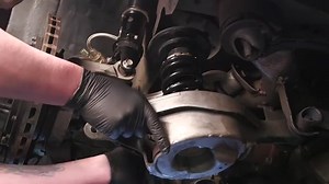 Adjusting rear coilovers separate spring and shock. - Height & Preload