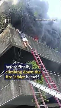 Watch woman save dogs before escaping flames herself during fire in Philippines