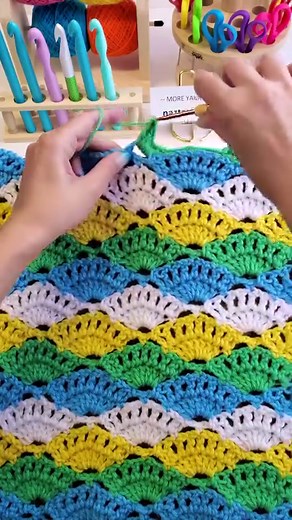 1.6M views · 14K reactions | This crochet shell stitch pattern is one I'm thinking of doing a full tutorial on in the upcoming year. It's primarily double crochet and single crochet. What do you think about it? #reels #crochet #knitting #ganchillo #howto #tutorial #yarnlove #shell #crochetlove #colorful #artwork #fiberart #maker #naztazia | Naztazia | Facebook
