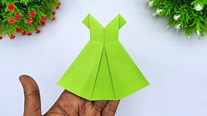 501K views · 19K reactions | Handmade paper cloth - How to fold easy dress with paper - Dress making tutorial without sewing #Crafts #PaperDress #OrigamiDress | Entertaining Arts | Facebook