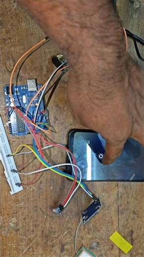 Touch-Activated Emergency Alert System using Arduino Uno with GSM 900A & GPS 📍