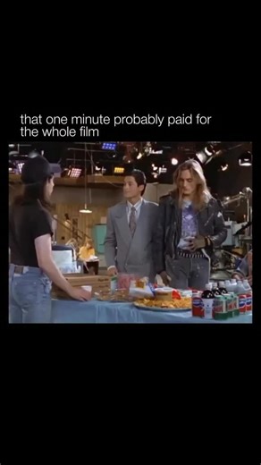 WASTED on Instagram: "🤔 Wayne’s World 2, released in 1993, is a comedy film that continues the adventures of Wayne Campbell and Garth Algar, played by Mike Myers and Dana Carvey. The movie picks up after the events of the first film and centers on Wayne’s quest to put on a massive rock concert called “Waynestock,” inspired by a dream message from the late rock legend Jim Morrison. As usual, the film is filled with absurd humor, fourth-wall-breaking jokes, and pop culture references that define