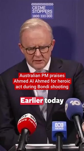 A fruit shop owner who tackled one of the Bondi Beach gunmen told his cousin to tell his family he “went down to save people’s lives” before he stepped in to act. Ahmed al-Ahmed, a father-of-two from Sydney, was seen tackling one of the gunmen before wrestling his weapon away from him during an antisemitic terrorist attack at a Jewish Hanukkah celebration in Sydney on Sunday. Video footage of Mr Ahmed intervening circulated widely on social media following the attack. #news #australia #bondi #bo