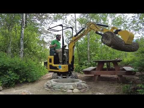 Tiny China Excavator lifts a Log.... warning: You will not be impressed!