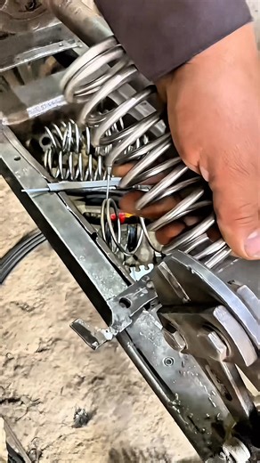 Watch how a master spring maker transforms a simple metal wire into a small, precise spring using an old hand-powered machine. No electricity — just years of skill, strength, and perfection in every turn! #SpringMaking #HandCraft #TraditionalSkills #MetalCraft #WorkshopLife #WireToSpring #OldMachines #SkilledWorker #ManualWork #Craftsmanship #HandMadeProcess | Creators Craft