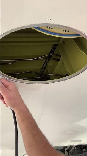 Roto Peening a fuel access hole panel flange on a Challenger 600 series aircraft