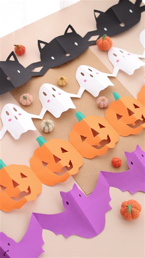 Jessica Wetherall-Buckle on Instagram: "Easy Paper Halloween Garland Decorations using @bakerross 👻 (Previous Ad) I used rolls of paper from Baker Ross so each Garland would be a little longer, then added a few extra details with Deco Pens ✨ Step one - Zip Zag Fold the paper Step two - draw on your half shape (let me know if you’d like a copy of my template shapes) Step three - cut your shape Step four - open it up and you should get a cute connected garland ✨ 🏷️Autumn Crafts, Halloween crafts
