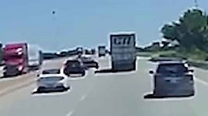 Dramatic moment semi-truck explodes after being struck by swerving driver - but, miraculously, no one was seriously injured