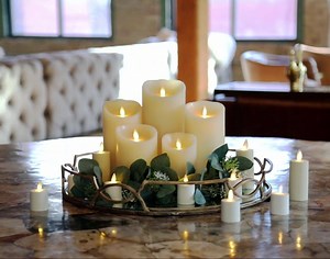 With a Luminara remote, you can control when your candles come on and off with the simple push of a button! | Luminara