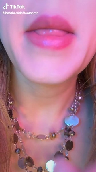 Captivating Lips and Lollipop: A Close-Up Experience